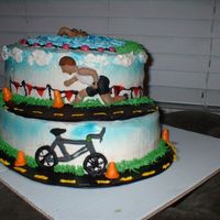 Triathlon Cake this cake is my first real cake sold to a client!!! it was a strawberry cake with cream cheese frosting for a 35th birthday party...the man...