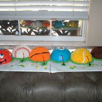 Caterpillar Cake this caterpillar cake is for a sports themed first birthday party...the grandma wanted primary colors and sports but also whimsy for a one...