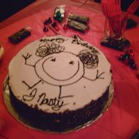 Character Cake This is a mocha cake, covered in BC with chocolate curls around the edge. The character is a stick figure my daughter first drew when she...