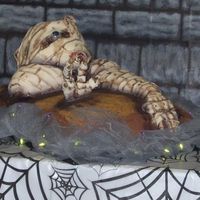 Mummy Cake This was made for a Halloween themed baby shower. The base is DH Halloween marble cake w/BC sanded w/natural sugar. The life-sized mummy is...