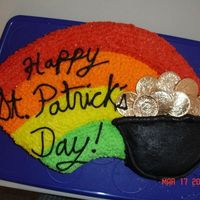 Pot Of Gold Shooting star pan with edible gold coins. Everything in buttercream.