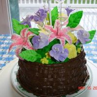 Flower Bouquet 6" round with half ball pan on top and MMF flowers. Basketweave BC