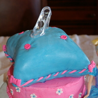 Cinderella's Slipper Pillow Cake This is a cake for a Cinderella and Shoe themed party for a little girl turning 2 years old. It is my first attempt at a "pillow&quot...