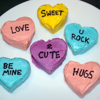 Conversation Heart Cupcakes These were conversation hearts that I made out of cupcakes (cake in silicone heart shaped mold I bought) and covered in melted chocolate. I...