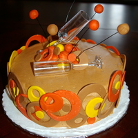 Circle Celebration This was a 8" layered cake. Chocolate BC with fondant circles cut out in the receipiants favorite colors which happen to fit in the...