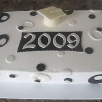 Church Graduation Cake This is the second cake I made for the graduates at my Church. Triple chocolate fudge cake with chocolate ganache filling, accents MMF....