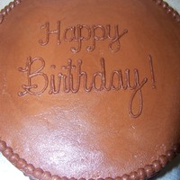 Chocolate Birthday Dark chocolate cake with chocolate buttercream. Scrolls were freehand.
