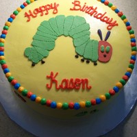 The Very Hungry Caterpillar chocolate cake with cakepro's buttercream. fruit and caterpillar are 50/50 fondant/gumpaste mix.