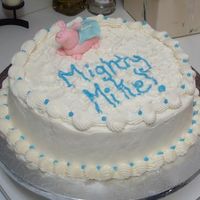Pig Cake I made this cake for my uncle as a joke. He asked me to make him a cake with Mighty Mike written on it and the pig was my husbands idea....