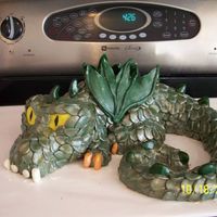 Green Dragon Sculpted out of rice krispie treats. Covered in MMF.