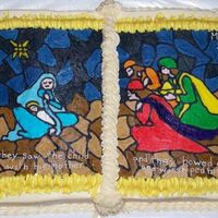Epiphany Cake I made this for an Epiphany party at church. It is a book pan and the picture is a FBCT. It turned out really good.