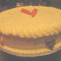Carrot Cake Just made it last night. The carrots and fruits are almond paste tinted in different colors to resemble real fruits. The frosting is cream...