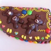 Baby Stage This is one piece of 9 pieces of birthday cakes I made for my beloved. This one is a stage when he was a baby. I made two pralines, teddy...