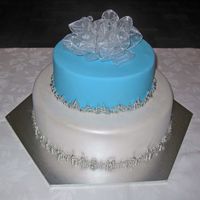 Engagement Cake 8" & 12 " Fondant covered cake was for my wonderful brother-in-law's engagement. This simple and beautiful design was...