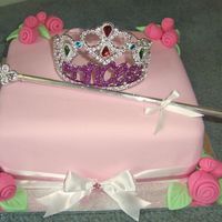 Princess Cake This birthday cake was for my 4 year old niece. The cake, flowers and leaves were all done in fondant. Thanks for looking !