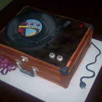 Record Player 3 1/2 sheet cakes stacked, covered in Satin Ice fondant with Satin Ice decorations.
