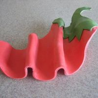 Chili Pepper Taco Plate Made a chili pepper plate to hold the cake tacos I made for a Cinco de Mayo party. Taco plate is gumpaste with a little fondant.