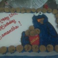 Cookie Monster Birthday Cake This cake was made for a young teen who simply loves the blue furry cookie gobbler from Sesame Street.