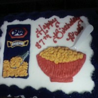 Mac & Cheese Birthday Cake This picture is of a sheet cake I made for and elderly gentleman's birthday. The theme was based on the gentleman's favorite food...
