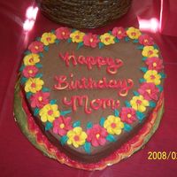 Valentine's Day B-Day Cake For my mom's birthday. Chocolate buttercream, royal icing flowers.