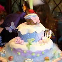 Fancy Nancy This cake was for my daughter's seventh birthday (Fancy Nancy theme). The bottom layer was strawberry cake, middle layer was sour...