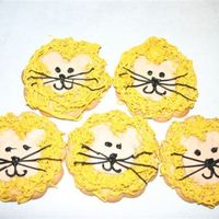 Lion Cookies These were made with a flower cookie cutter. Royal frosting. The mane was made with the grass/fur tip.