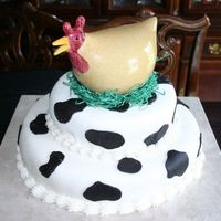 Chick Fil A This is the cake for a Chick Fil A party. Butter cake with oreo filling. Fondant.