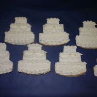 Wedding Cake Cookies Friend ordered these wedding cake cookies to be used as place cards at a bridal shower. Cookies are covered in fondant that is cut with...