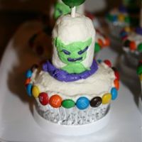 Alien Cupcakes These were fun! They were filled with nerds candies. Marshmallows with frosting on top. M&Ms for lights, dum dum on top. Idea from the...