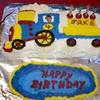 Train This is a cake for a friend's son. He wanted Thomas but she ordered the wrong pan. He liked it anyway.