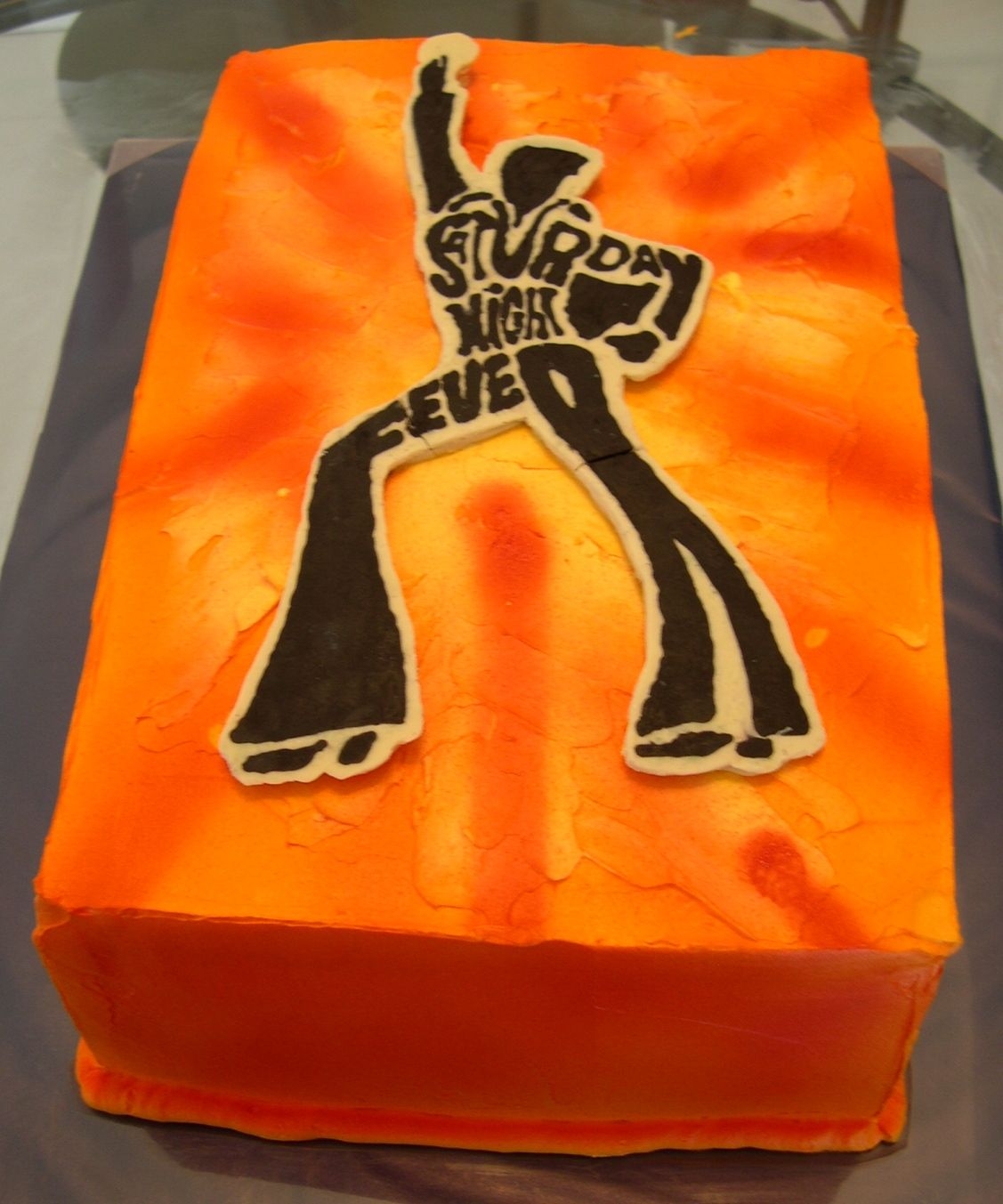 Saturday Night Fever! This is the album cover of Sat Night Fever - for my husband's 40th party (70's theme). I made John out of white chocolate and...