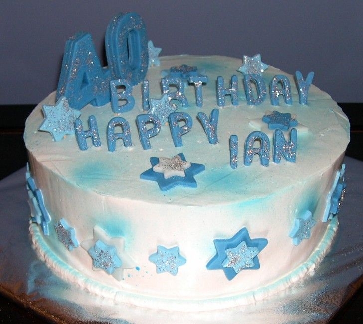 40Th Birthday Cake I'm only a beginner! I sprayed white whipped icing and added fondant stars and numbers.