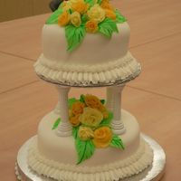 Class 3 Final Cake View1 This is the final cake for class 3. My instructor was wonderful! The cake is orange with buttercream frosting, covered in fondant. The...
