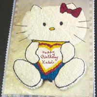 Hello Kitty Carved from an 11x15 sheet cake and iced completely in buttercream. Whiskers are uncooked spaghetti.