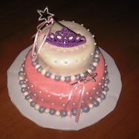 Princess Cake Princess cake with pearls, tiara and wand. Chocolate Fudge with buttercream icing and fondant.