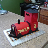 Train Carved train, Buttercream with fondant accents.