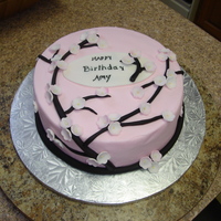 Cherry Blossom Buttercream with fondant branches and flowers. Medium flower stamens were used and most flowers were dusted with pink dust.