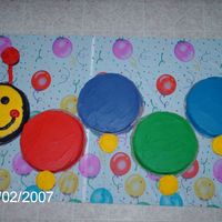 Baby Einstein Caterpillar I made this cake for my son's first Birthday. We used the face as his smash cake. It was my first real attempt at any type of...
