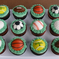 Sports Cupcakes... I did these for a little boys 2nd B-day, he loves sports.... chocolate cakes w/ buttercream frosting and fondant decorations.TFL!!