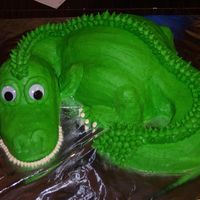 Dragon / Dinosaur Cake Cake I made for my good friends 4th birthday. He was really into dinosaurs at the time. He just loved it.