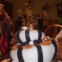 Topsy Turvy Graduation Cake This was my very first attempt at doing a topsy turvy sculpted cake. This cake was actually made as a graduation cake for a friends niece....