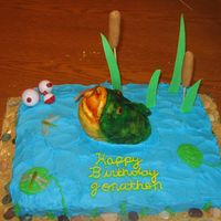 Fishing fish is rice crispy covered in fondant hand painted