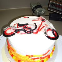 American Chopper Black Widow chocolate and yellow tiers, with BC and gumpaste chopper. this was on;y my second time ever using gum paste, i think i have a lot to learn...