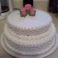 Baby Shower Cake was asked to do a twist on a cake from course 1... tried to spice it up at tad, but still keep it classy. first time making a gumpaste rose...