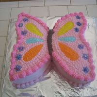 Butterfly Cake My daughter's birthday cake. Decorated in all buttercream. I cut it freehand from a square cake.