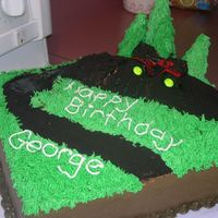 Atv Cake Lemon cake with lemon b/c icing and filling. It was a fun cake to do. The trail is Oreo crumbs, there's a mud puddle, and the trees...