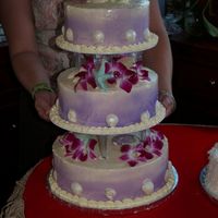 Island Themed Wedding Cake The bride wore royal purple (older bride 1st marriage) and wanted the cake to be purple. The seashells are white chocolate. The reception...