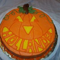 Jack O'-Lantern Jacko-o'-lantern cake. Cake is red velvet but the color orange with bc incing the family name is in the smile (Hollander) This was fun...
