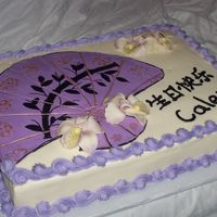 Happy Birthday In Chinese This cake was for a 10th birthday. The orchids are gumpaste the fan is fondant. I also did cookies to match