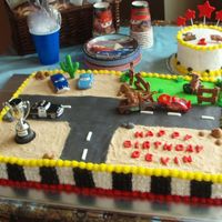 1St Birthday Cake Cocunut cake with pineapple filling. Buttercream frosting with MMF accents. I made two 11x15 sheet cakes, torted them, and placed side by...